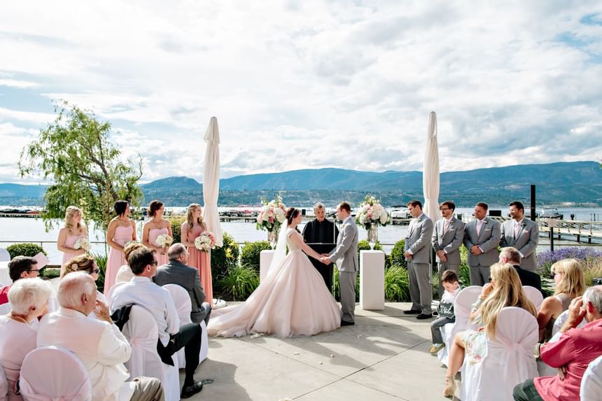 A wedding ceremony at the patio in Manteo Resort Waterfront
