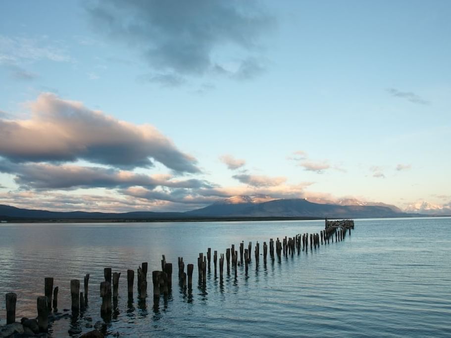 Wooden barrier on the sea, evening view near NOI Indigo