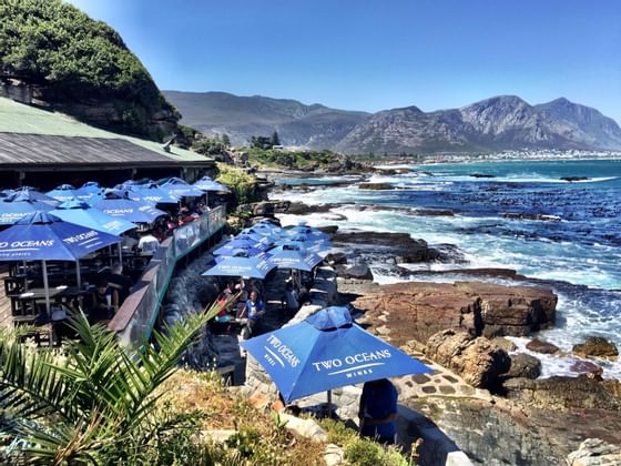 Bientang's Cave restaurant on the rocks by the sea in Hermanus
