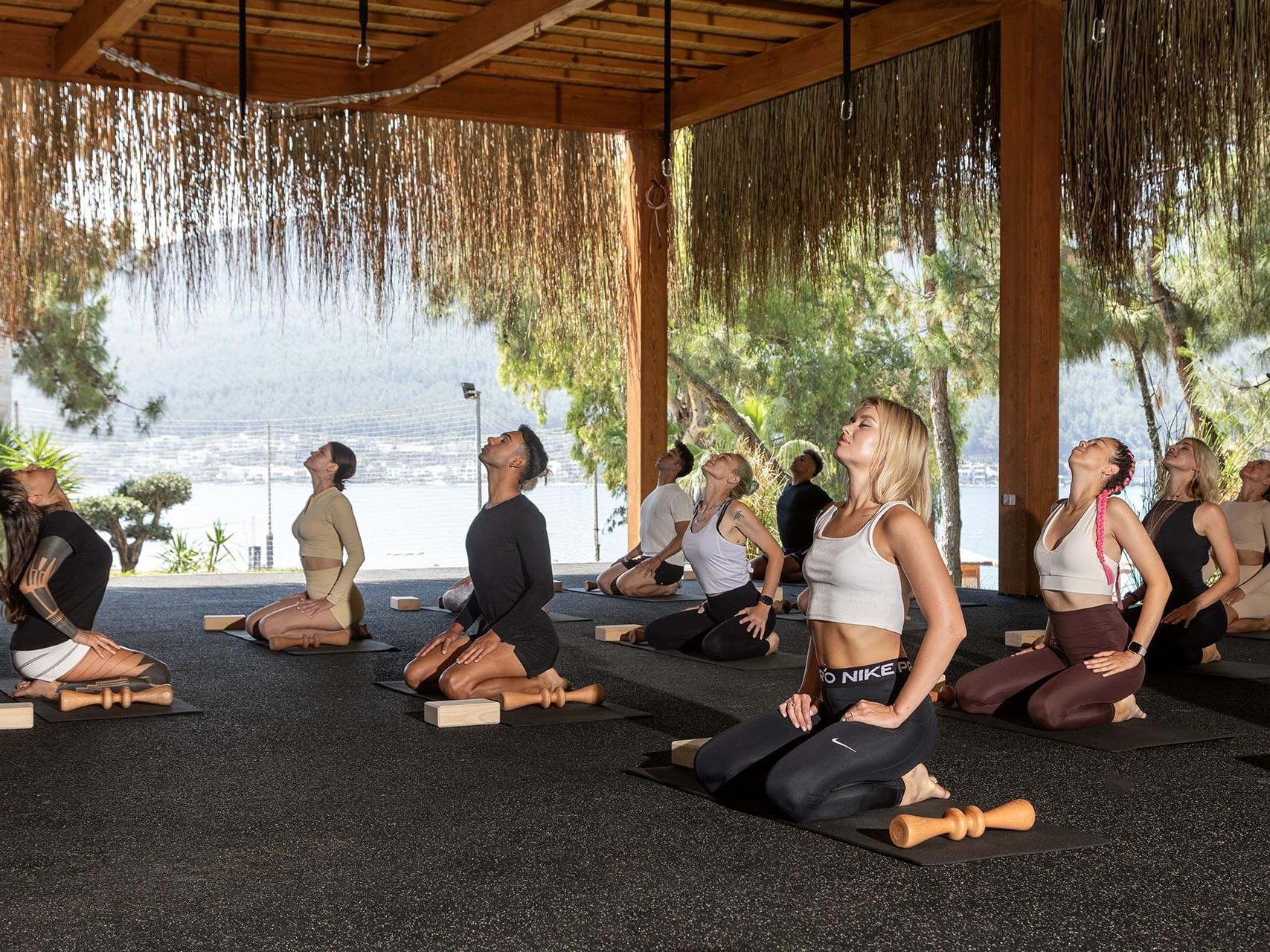 At Titanic Luxury Collection Bodrum, those practicing yoga by the sea breathe in serenity.