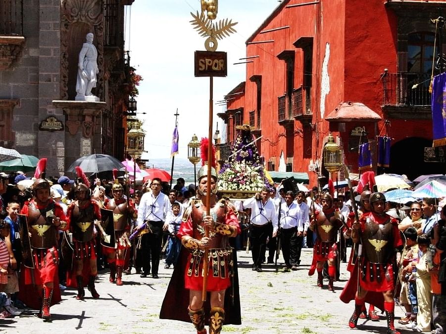 People gathered for a ceremony near Fiesta Americana Travelty