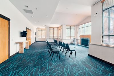 Chair arrangement in Peak Room at Aava Whistler Hotel