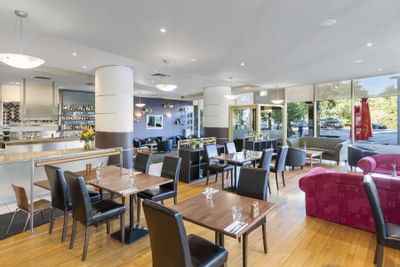 Interior of a dining hall at Nesuto Hotels