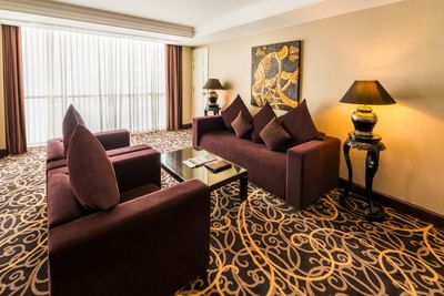 Living area with sofas in Club Grand Executive Suite at Eastin Grand Hotel Saigon