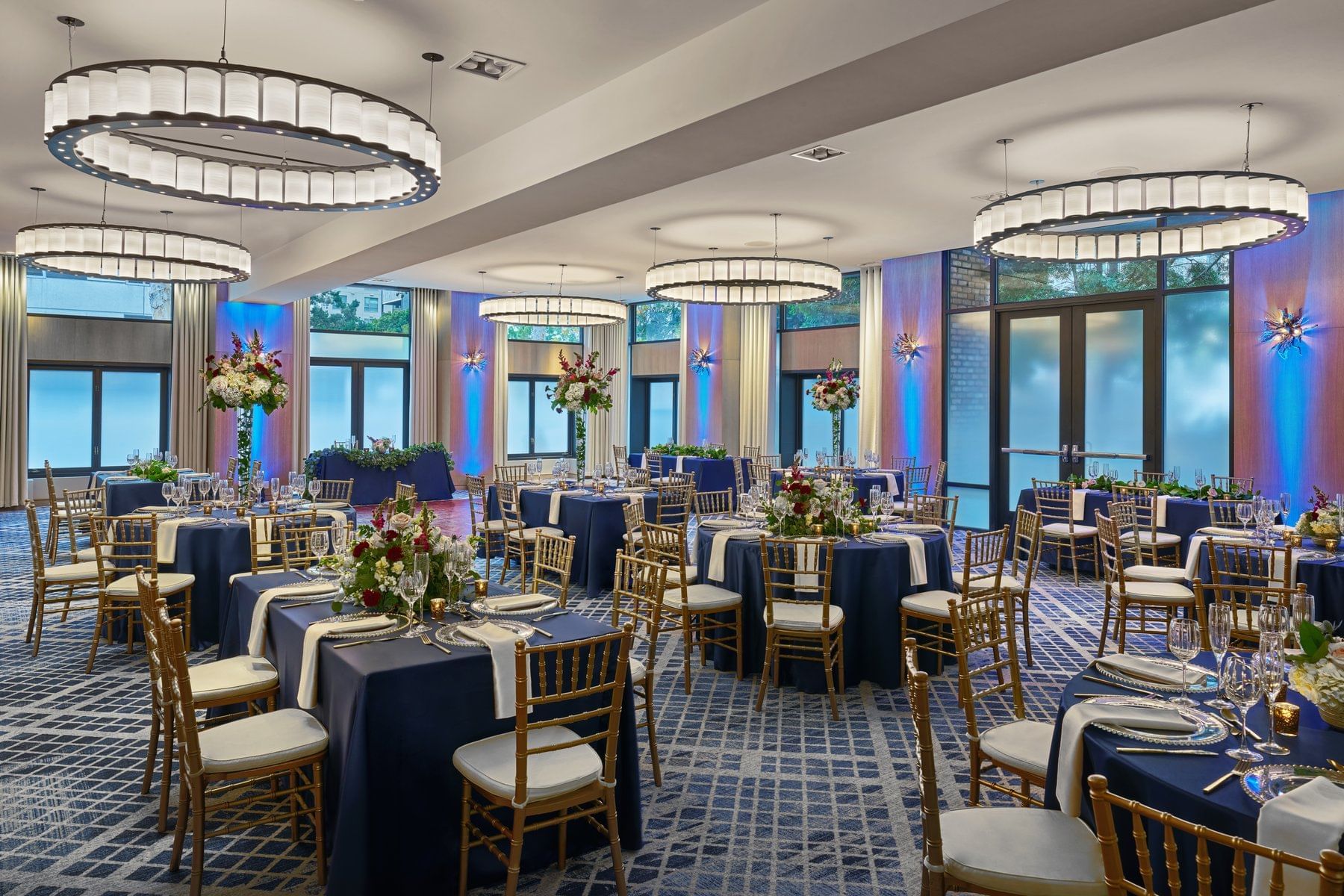 Hall arranged with banquets & flowers for an event at Hotel Republic San Diego