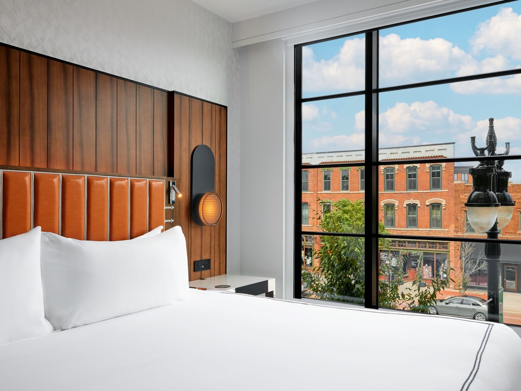 Cozy bedroom featuring a bed with a serene view in 1 King Bed at Godfrey Hotel Detroit