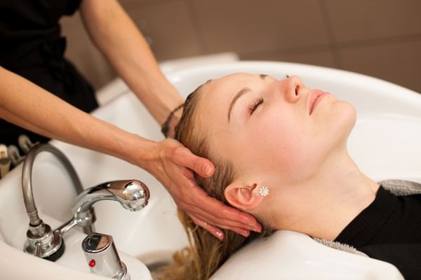 Lady having a treatment in a Spa near Lake Buena Vista Resort Village & Spa