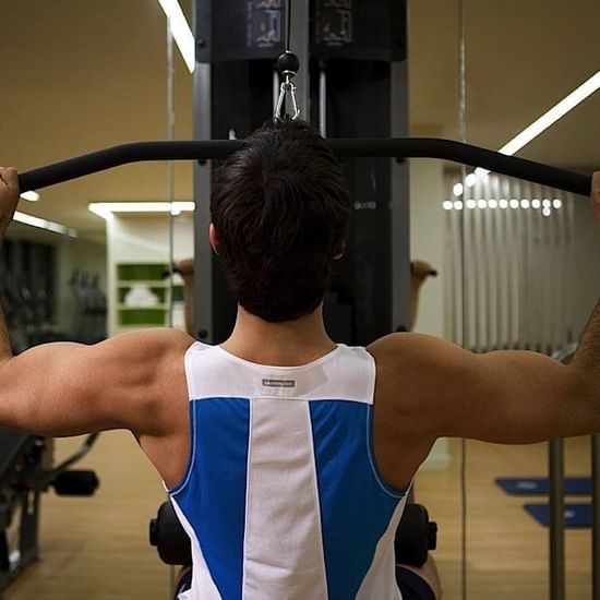 Man exercising in the gym at Pullman Sydney Olympic park 