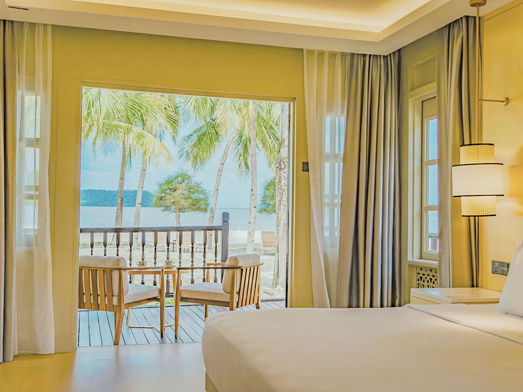 King bed & balcony in Island View, Pelangi Beach Resort & Spa