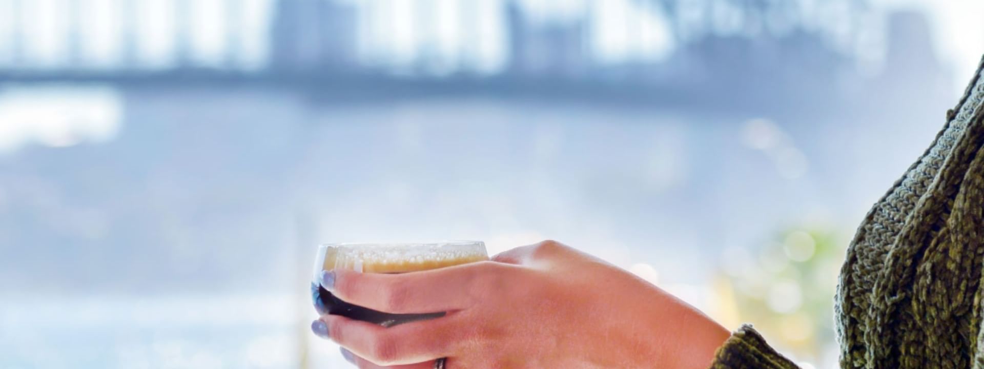 Close-up of lady having wine at Pullman Quay Grand Sydney