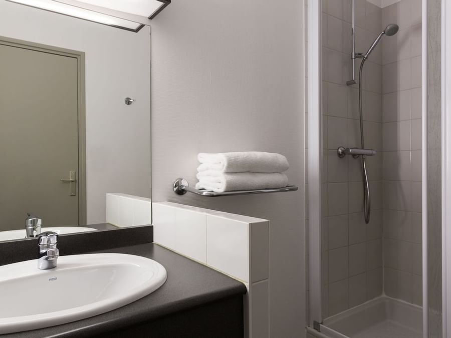 Bathroom vanity in bedrooms at Hotel Alize