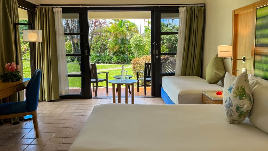 Elegant Garden View Room with sliding doors at The Naviti Resort in Korolevu.