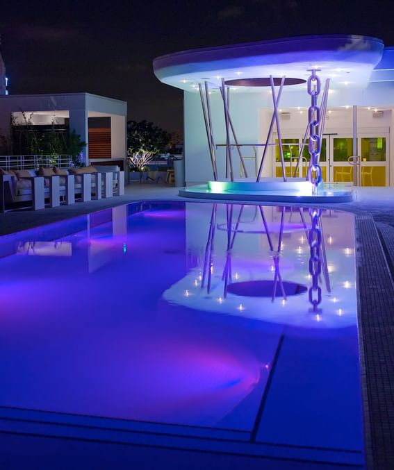 Night time dining & lounge with pool area at Dream south beach.