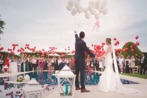 A bride and a groom renewing their vows, finally getting to have the wedding they've always dreamed of.