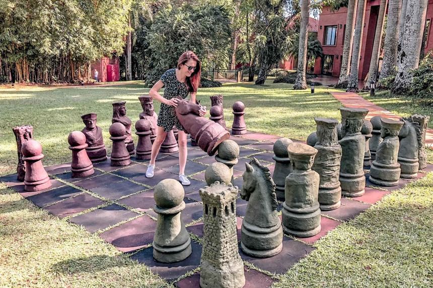 Lady playing ground chess at Grand Hotels Lux