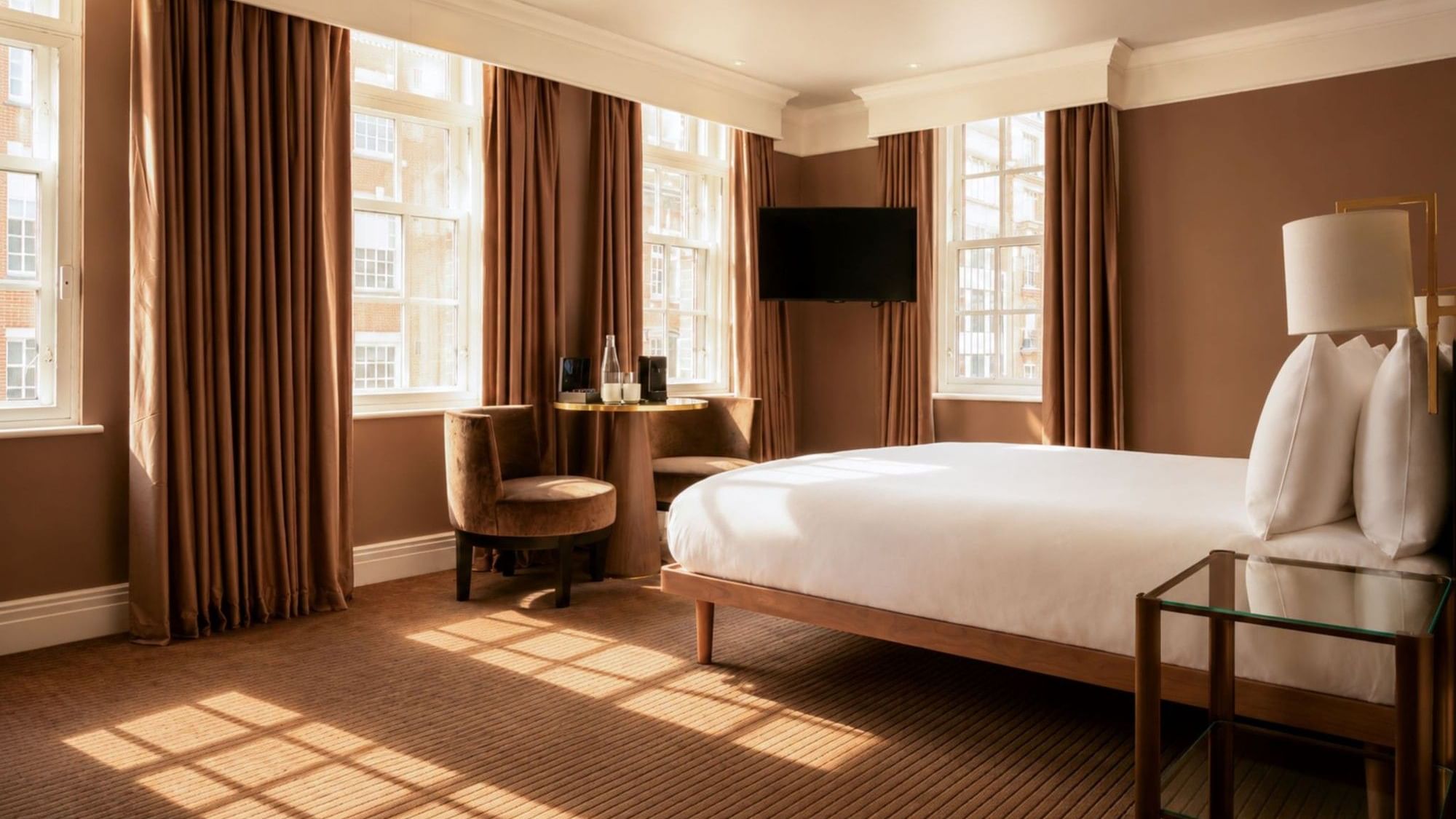A luxurious Collection Deluxe Room at The May Fair Hotel in London