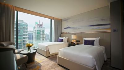 Comfy beds in Family room at Carlton Hotel Bangkok Sukhumvit