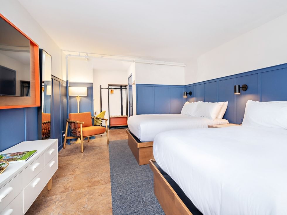 Twin beds & TV at the Double Queen Room at Bardstown Motor Lodge in Kentucky.