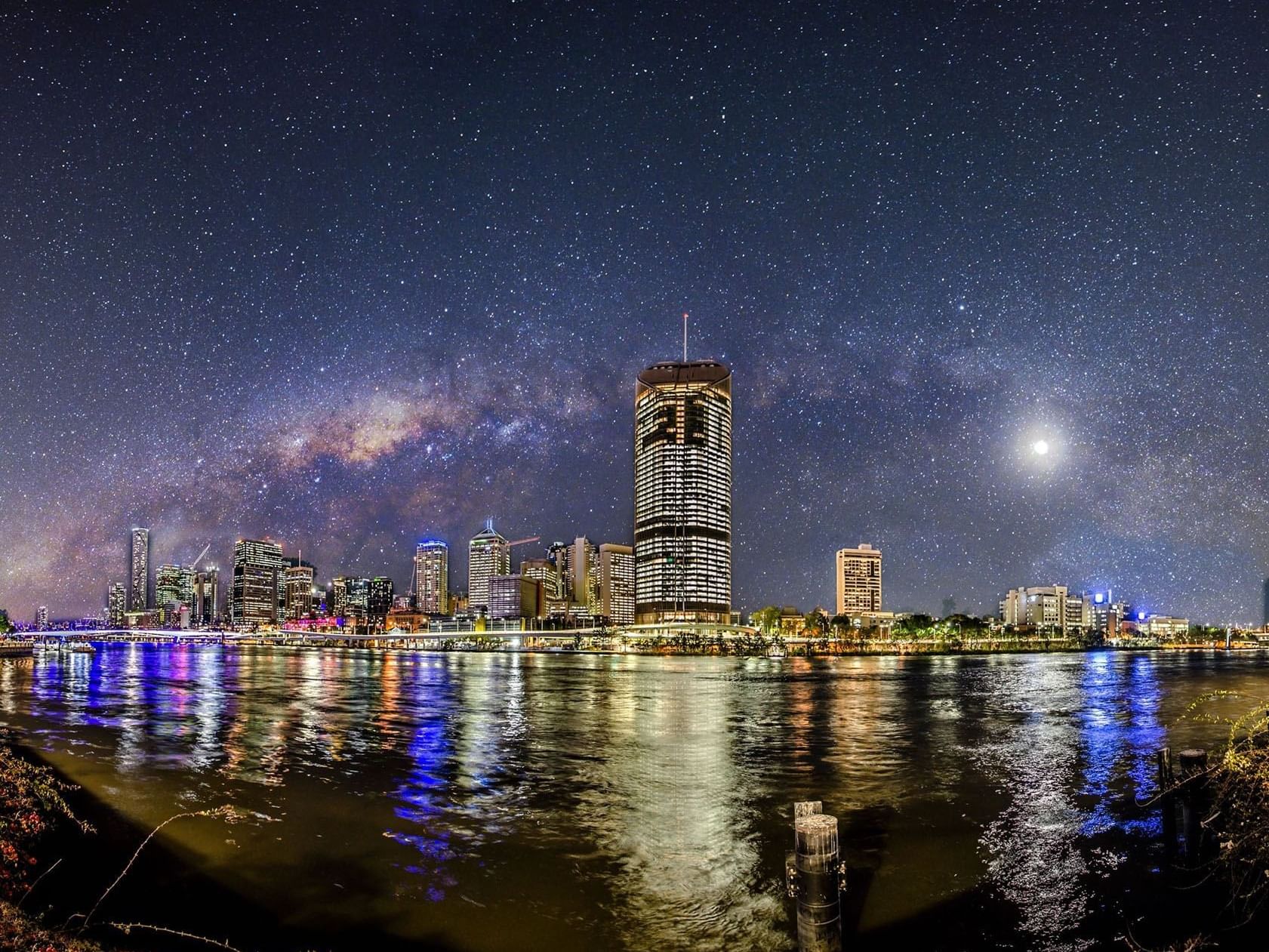Brisbane skyline at nighttime near Grand Chancellor Brisbane