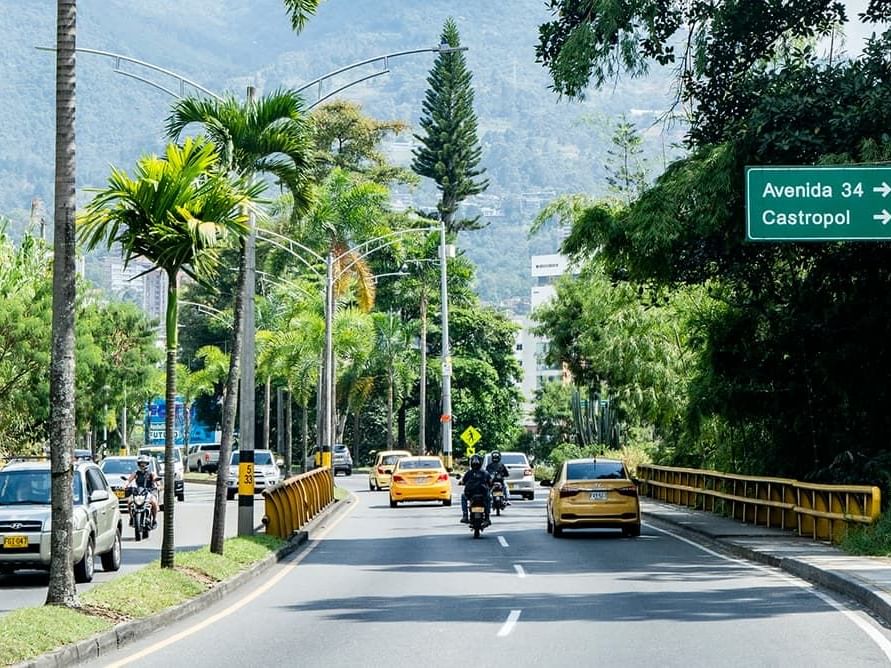 Vehicles moving in Las Palmas Avenue near Diez Hotel Categoría