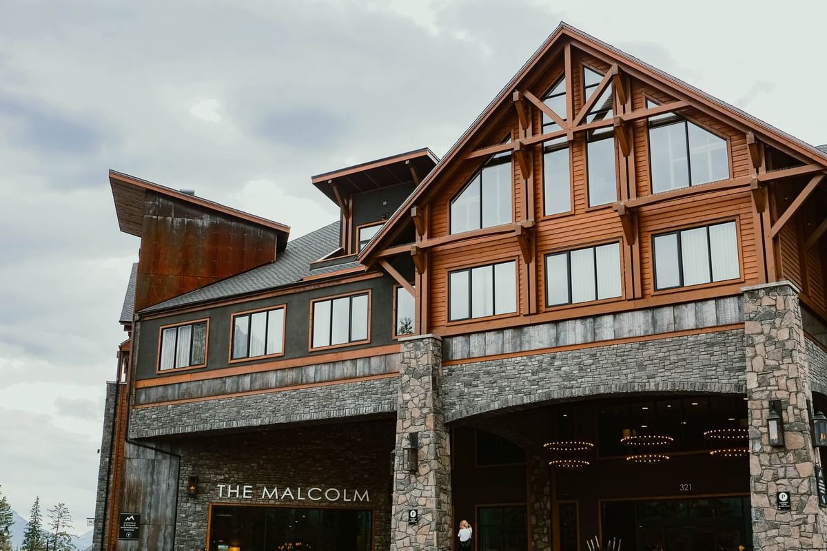 The Malcolm Hotel exterior and Rocky Mountain setting