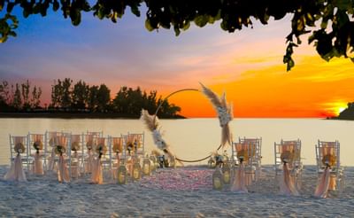 Wedding decorations with seats on the beach at The Danna Langkawi