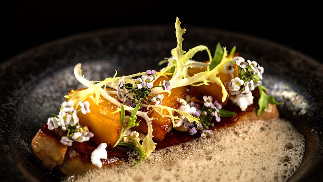 Close-up of a fine dish served in Jeff's Cellar at The Banjaran Hotsprings Retreat