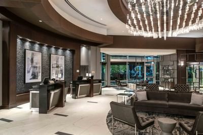 lobby with two reception desks and several seating areas