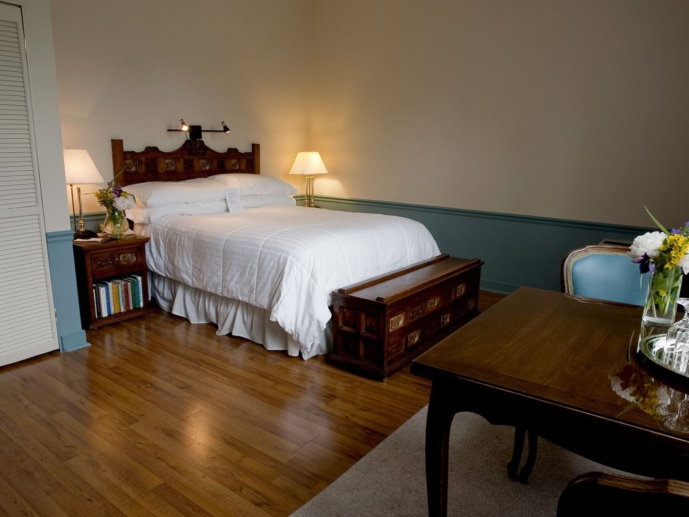 Queen bed in Traditional Queen Room at La Tourelle Hotel and Spa