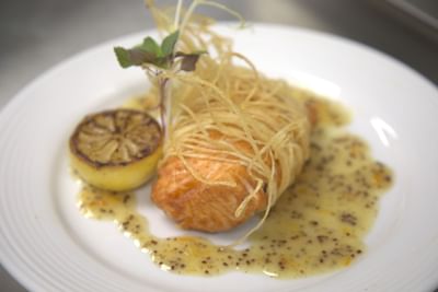 Salmon & lime dish served at Trianon Bonita Bay