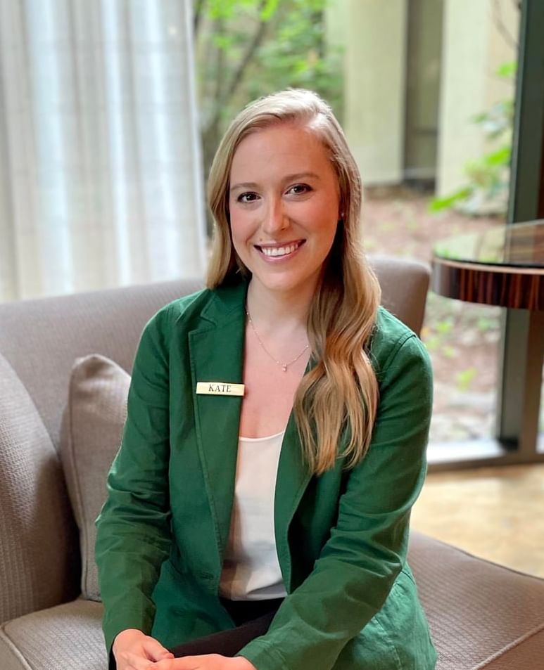 Portrait of a staff member on the lobby lounge at Umstead Hotel and Spa