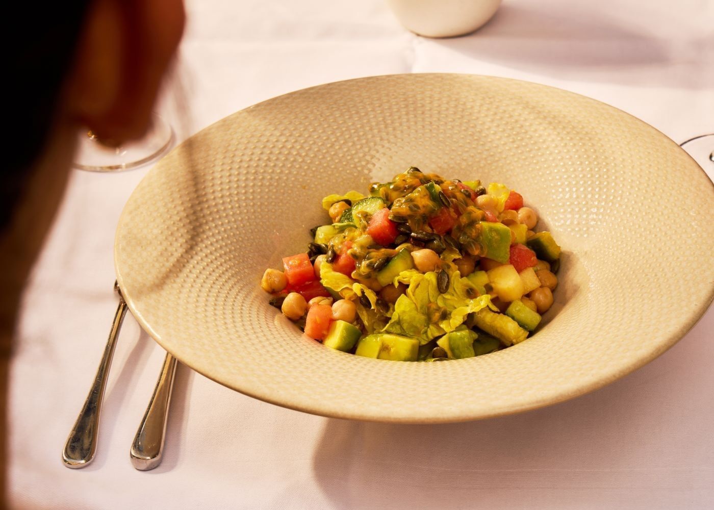 Superfood Glow Salad with chickpeas, diced vegetables, and herbs at Whitcombs