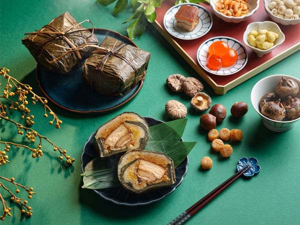Traditional Chinese Zongzi dishes served on a table at Carlton Hotel Singapore