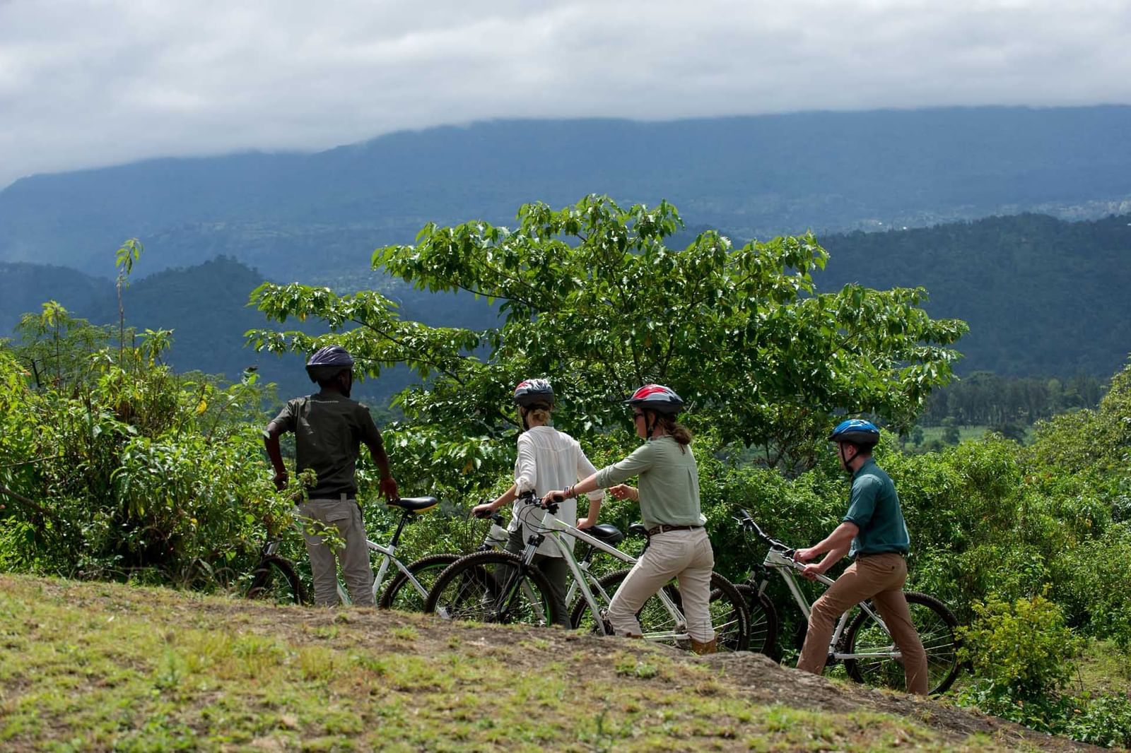 People Mountain Biking near Arusha Serena Hotels