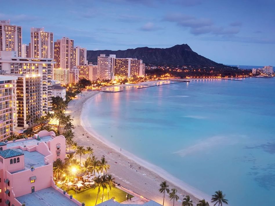 Aerial view of the Waikiki City at night near Waikiki Resort Hotel by Sono