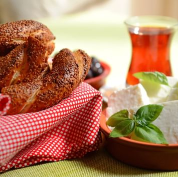 Simit Tea served with pretzels & cheese near Titanic Port Bakirkoy