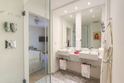 1 Bedroom Lanai Bungalow washroom with toiletries at Windsong Resort On The Reef