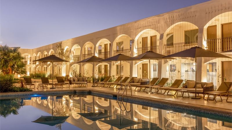 Sunbeds by the outdoor swimming pool at Gamma ciudad Juarez