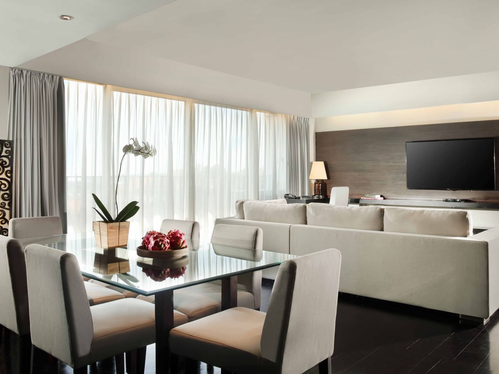 Living and dining areas in Penthouse at U Hotels and Resorts