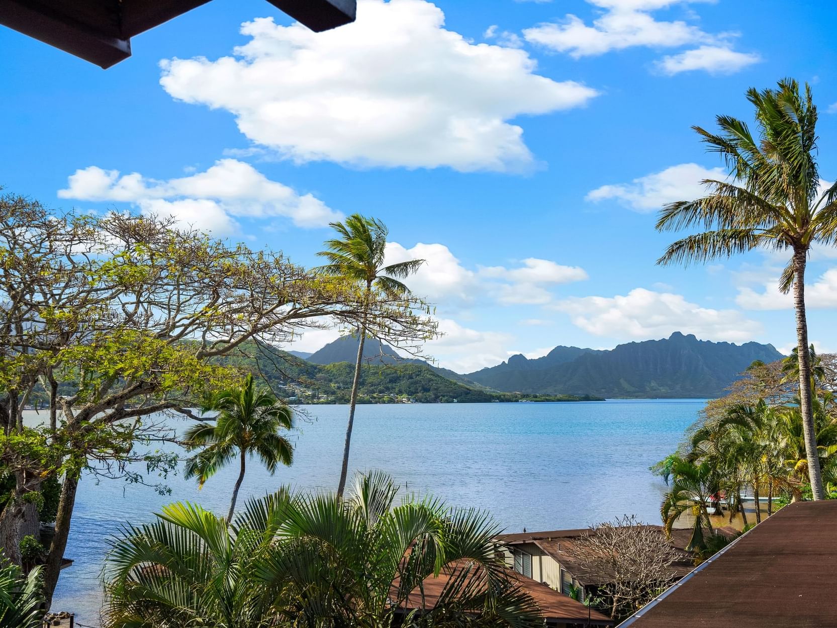 Balcony overlooking the view from One-Bedroom Suite Bay View at Paradise Bay Resort