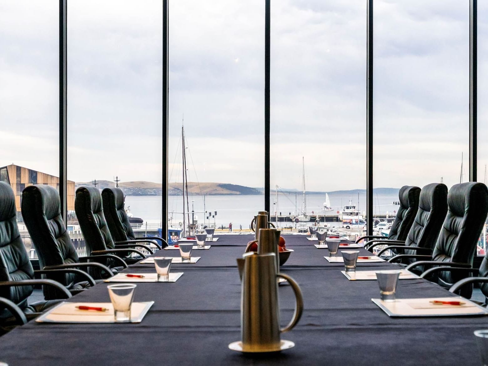 Conference table arranged for a meeting in Harbour View 2 at Grand Chancellor Hobart