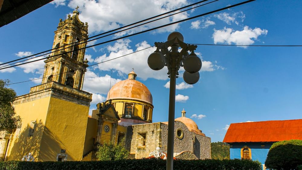 Historic Pueblo Mágico Mineral del Monte with a domed roof and stone details near Camino Real Pachuca