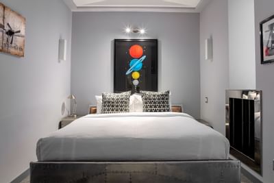 Closeup of a bed in King Premiere First Class at Retro Suites