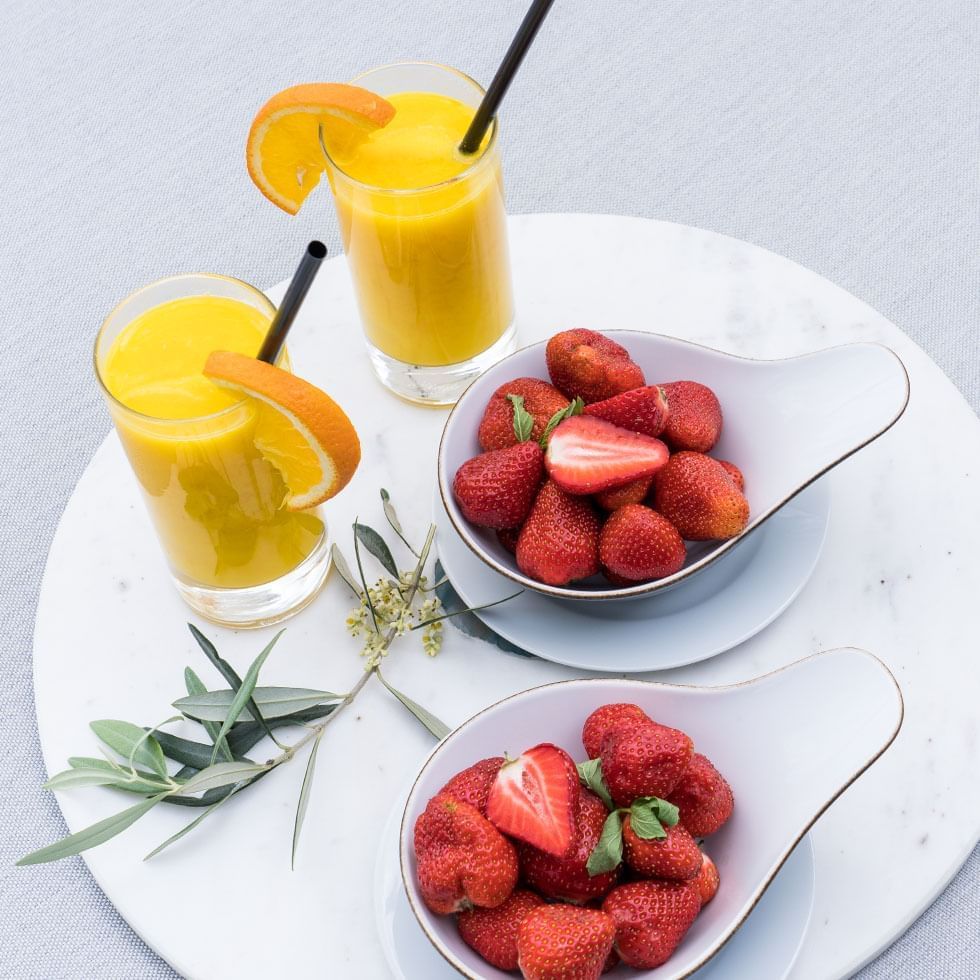 Close-up of strawberries & fruit juices at Falkensteiner Hotels