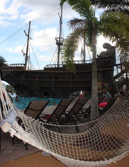 Poolside hammocks with Pirate ship centerpiece at Lake Buena Vista Resort Village & Spa