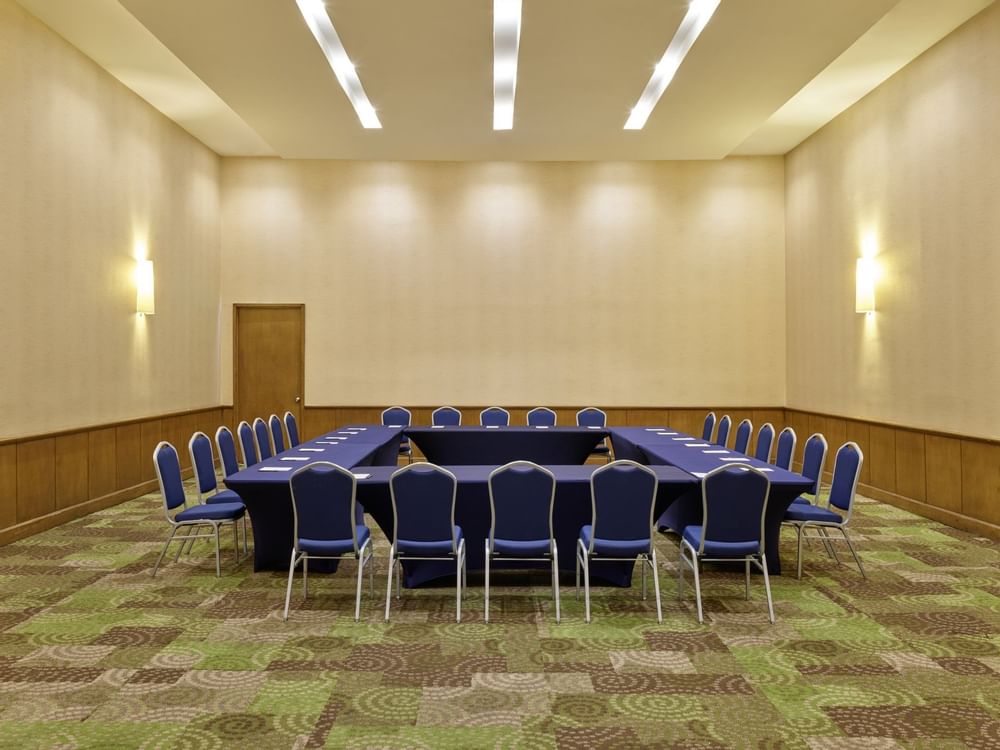 Conference table setup in Magnolia meeting room at FA Hotels