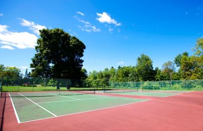 Outdoor tennis court at Honor’s Haven Retreat