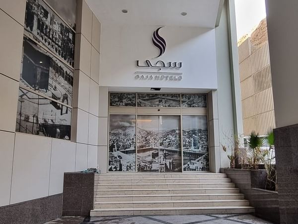 Saja by Warwick Makkah hotel entrance with steps and tiled floor at the lobby.