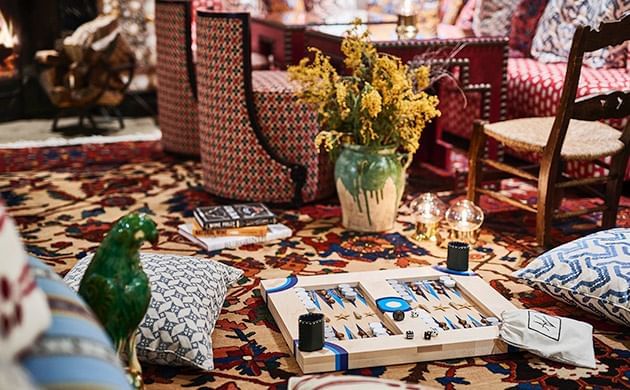Books & a Game board on the floor in a lounge at Marbella Club