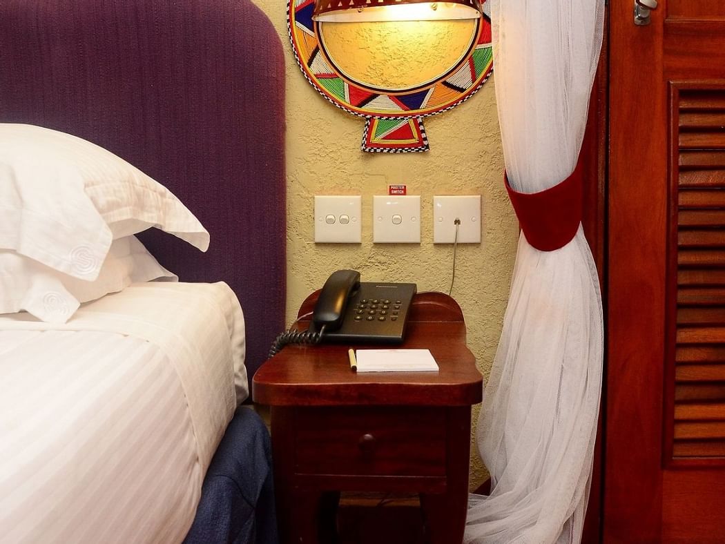 Night stand in the Twin room at Amboseli Serena Safari Lodge